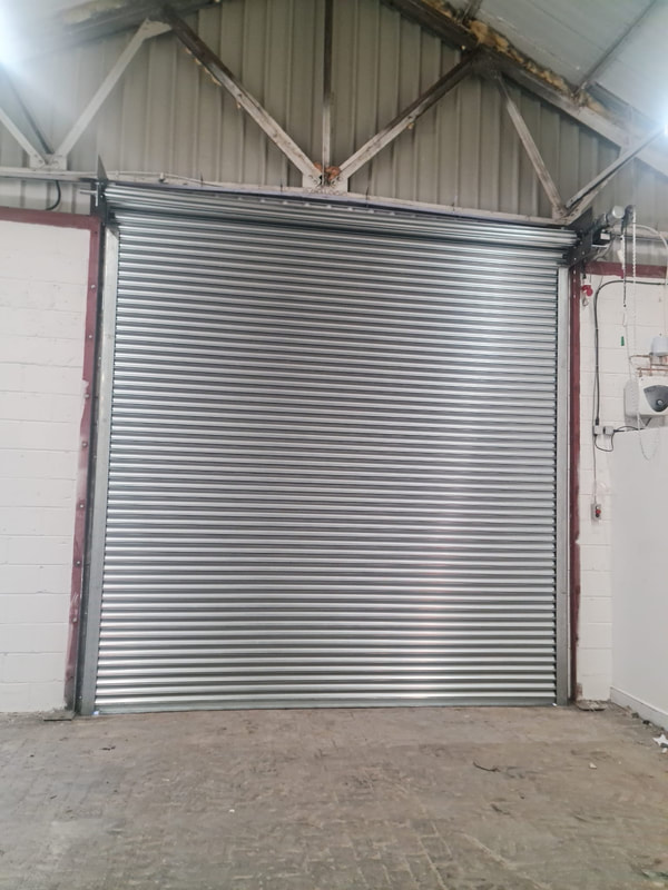 Roller Shutter Repairs Doncaster, How To Put Garage Door Back On Track